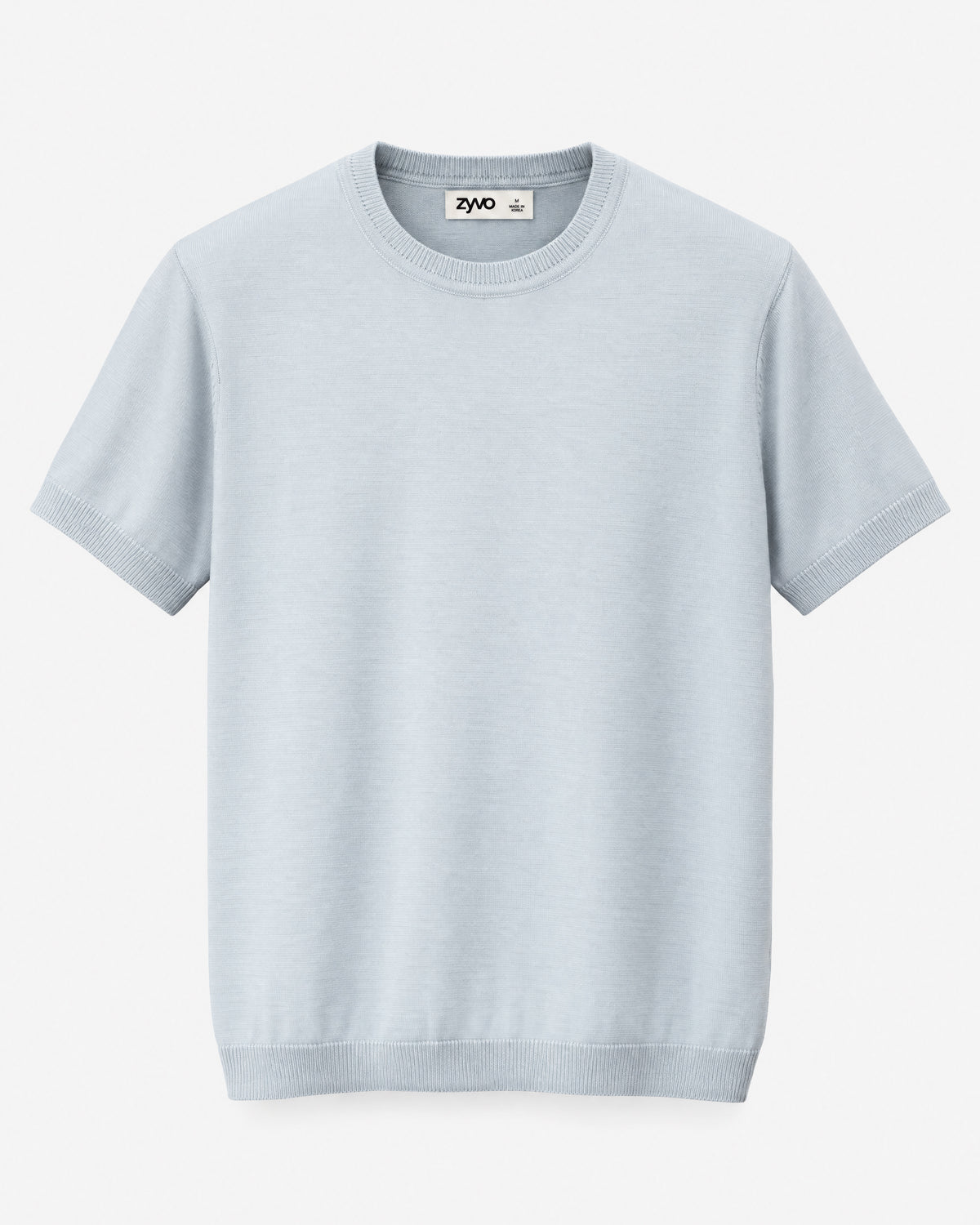 Sol Knit Tee — Coastal Sky flat lay